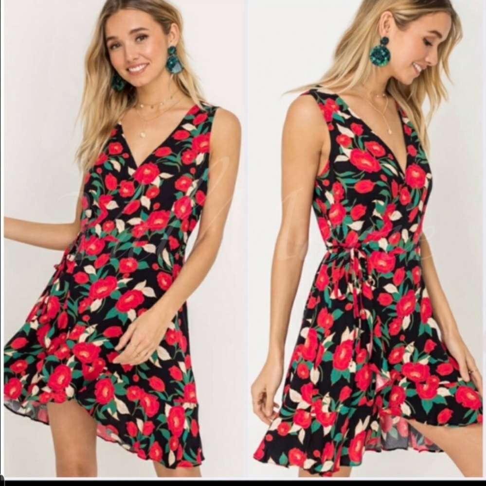 Black fabric wrap style dresses with red floral